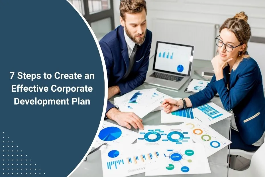 A team of business professionals collaborating on a corporate development plan using charts and a laptop in a modern office.